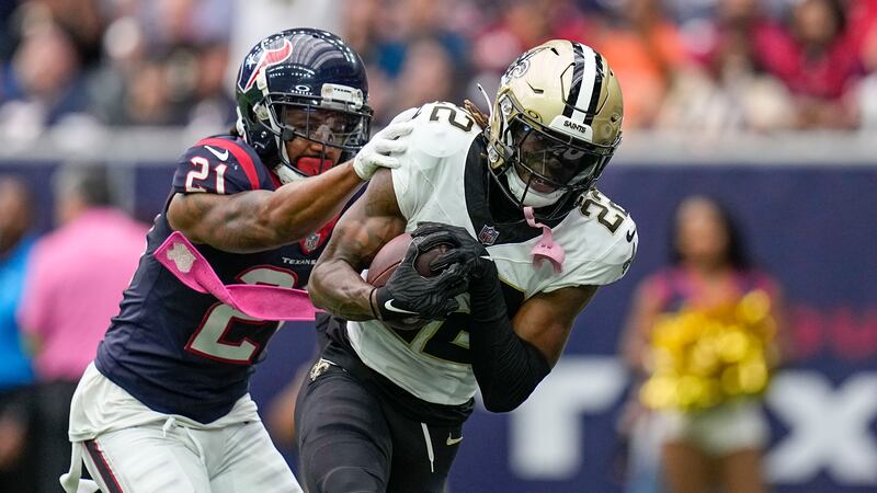 Saints wide receiver Rashid Shaheed (22) pulls in a touchdown pass against Texans cornerback...