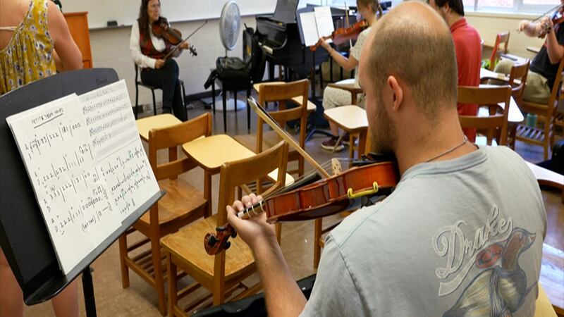 Students at the University of Louisiana-Lafayette learn traditional music.