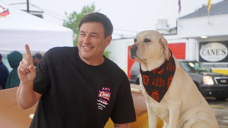 Founder and CEO of Raising Cane's, Todd Graves, celebrating the launch of a new collaboration...