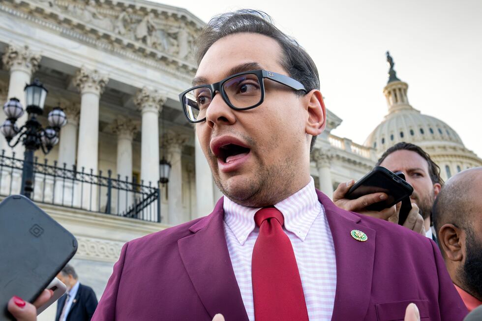 FILE - Rep. George Santos, R-N.Y., speaks to reporters outside the Capitol, in Washington, May...
