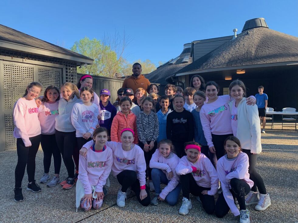 One 11-year-old group raises almost $20,000 to build a house facility for Our Lady of the Lake...