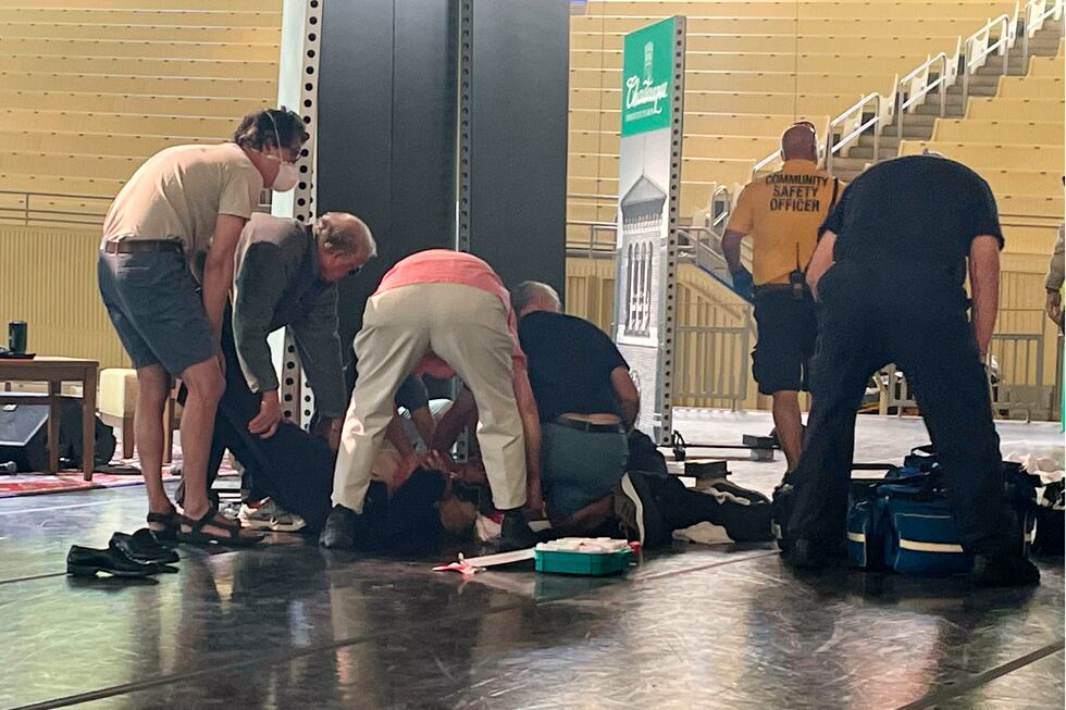 Author Salman Rushdie is tended to after he was attacked during a lecture, Friday, Aug. 12,...