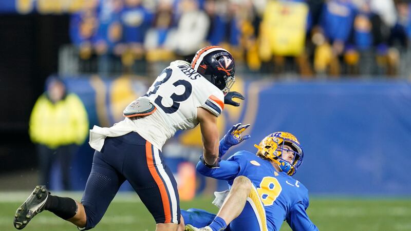 Virginia inside linebacker West Weeks (33) knocks Pittsburgh quarterback Kenny Pickett (8)...