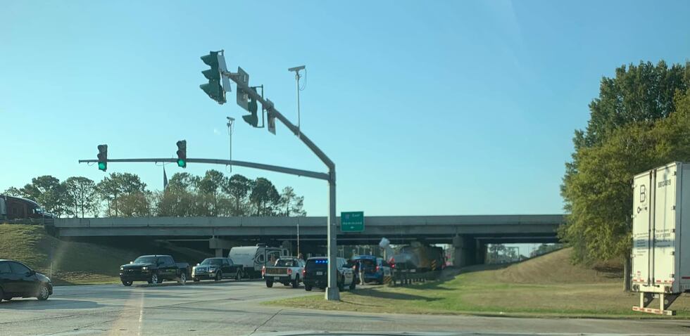 Officials are responding to a helicopter under an overpass in Denham Springs.