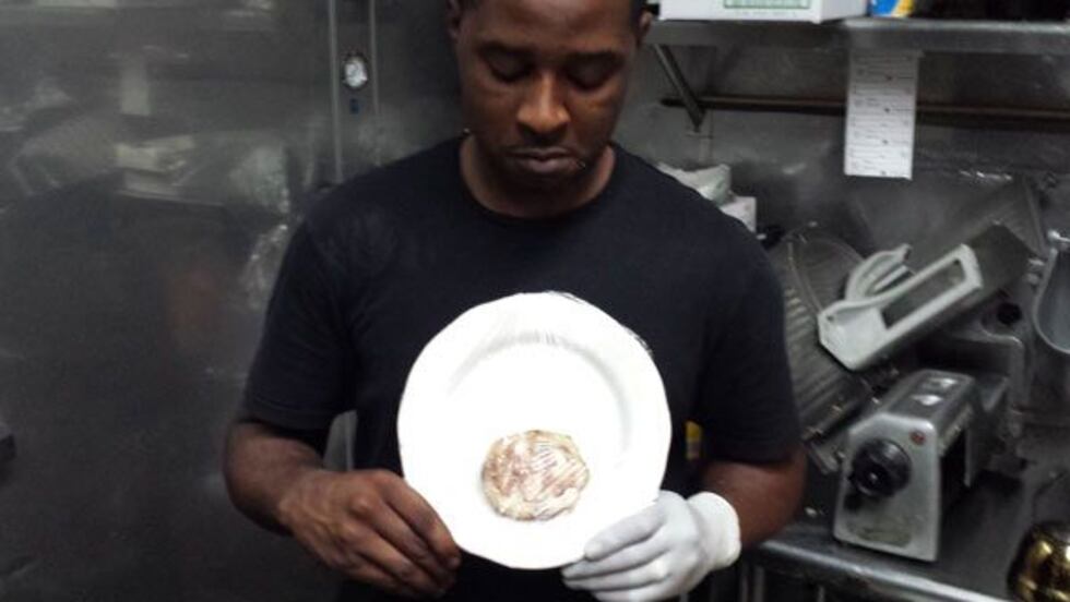 Jemarcus Brady holding the "GOD" eggplant (Source: Jemarcus Brady)