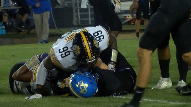 U-High defensive tackle Jaquelin Roy (No. 99)