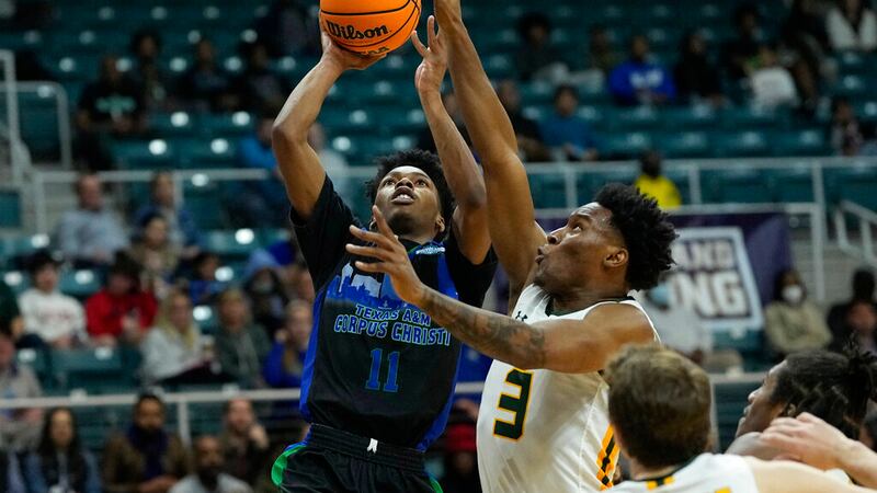 Texas A&M Corpus Christi's Terrion Murdix (11) goes up for a shot as Southeastern Louisiana's...