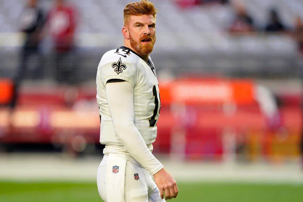 New Orleans Saints quarterback Andy Dalton (14) warms up prior to an NFL football game against...