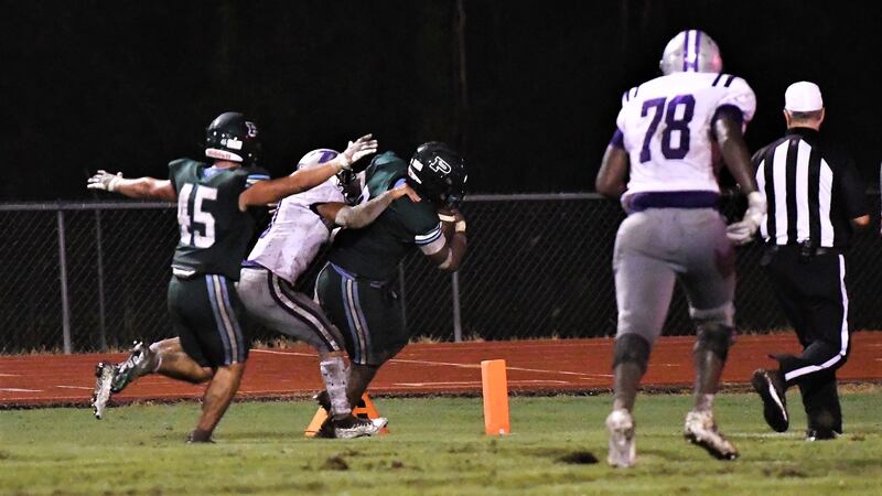 Ponchatoula defensive lineman Tyler Bailey scores a touchdown on a 22-yard interception return
