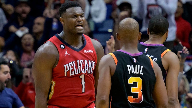 New Orleans Pelicans forward Zion Williamson (1) yells at Phoenix Suns guard Chris Paul (3)...