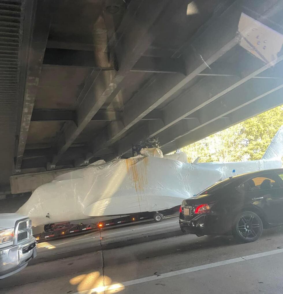 Officials are responding to a helicopter under an overpass in Denham Springs.